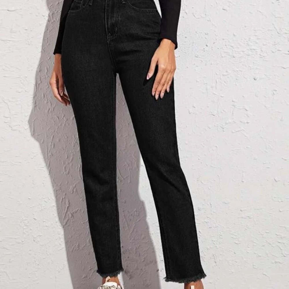 Black, raw hem pants.